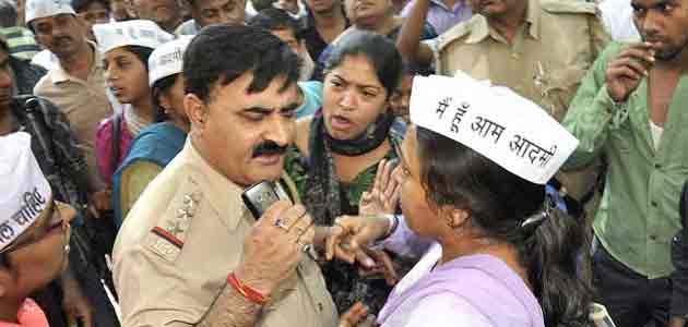 AAP volunteers protest against police inaction in a rape case in Delhi.