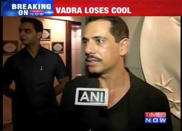 Robert Vadra loses his cool and misbehaves with a reporter at Ashoka hotel in New Delhi when asked about his land deals.