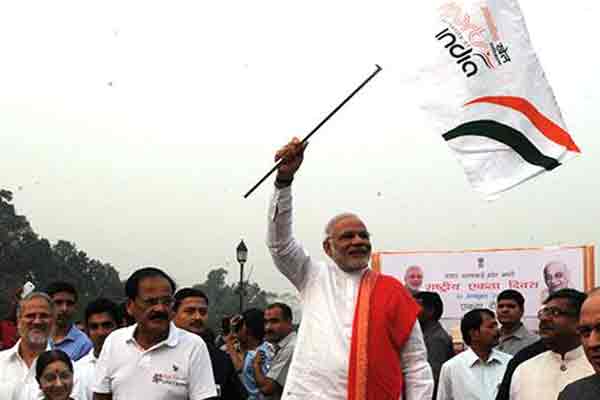Narendra Modi flags off 'Run For Unity' on the death anniversary of Sardar Vallabhbhai Patel in Delhi.