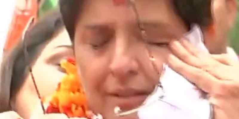 Former tough cop Kiran Bedi breaks down during an election rally in Delhi.
